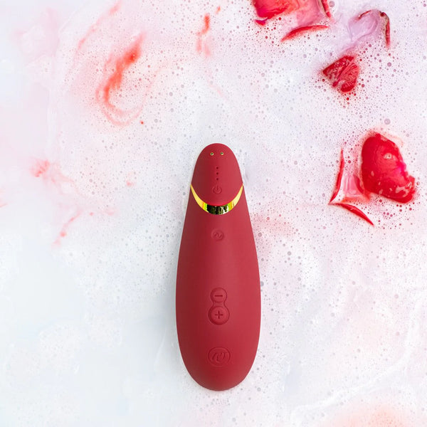 Womanizer Premium Red/Gold - Your Perfect Moment